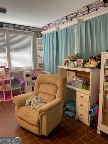 a room with toys and flat screen tv