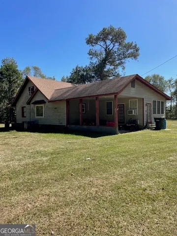 a view of a house with a swimming pool
