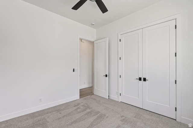 2862 South Mountain Rnch Road Cedar City, UT 84720 - Photo 39 of 64 Interior space featuring white walls and grey patterned carpet