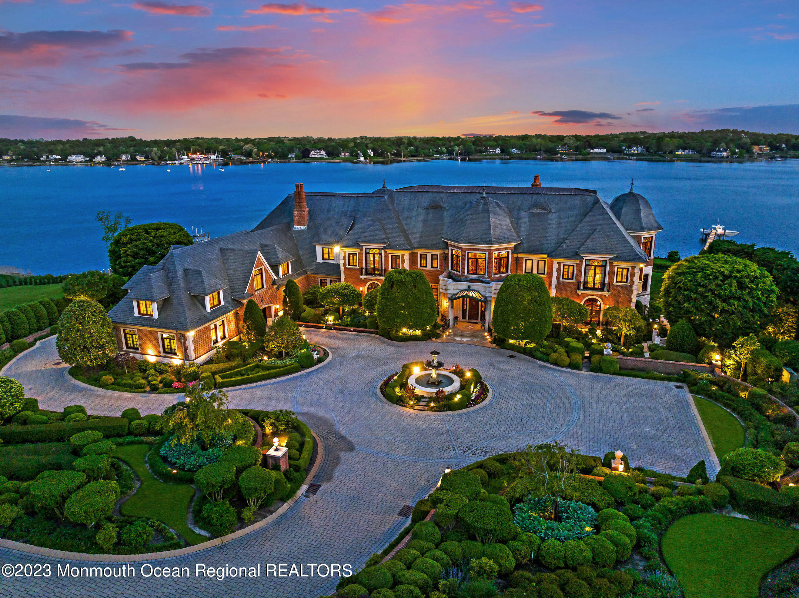 an aerial view of a house with outdoor space