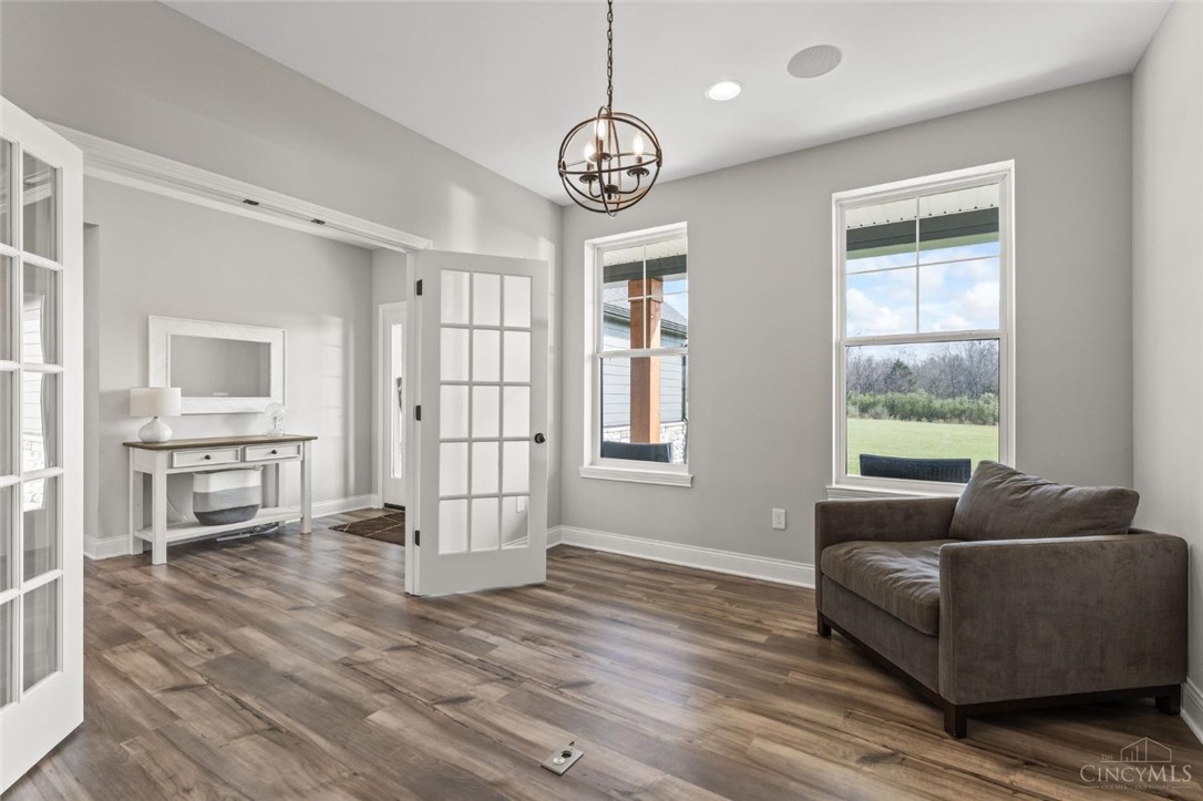 2425 Middleboro Road Clarksville, OH 45113 - Photo 29 of 91 This bright living space features elegant French doors and durable wood flooring.