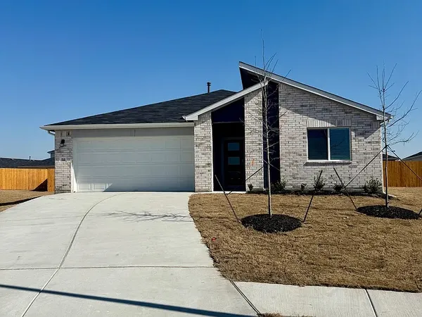 a view of the house with garage