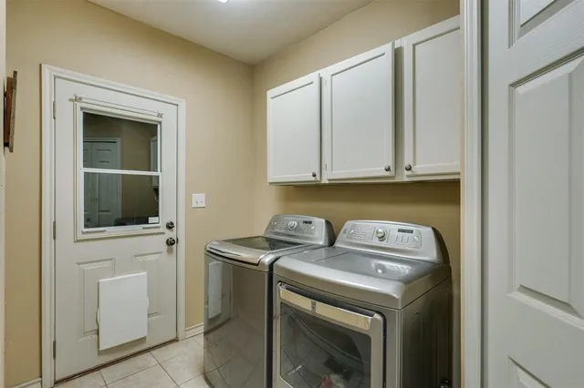 a view of a kitchen with electric appliances