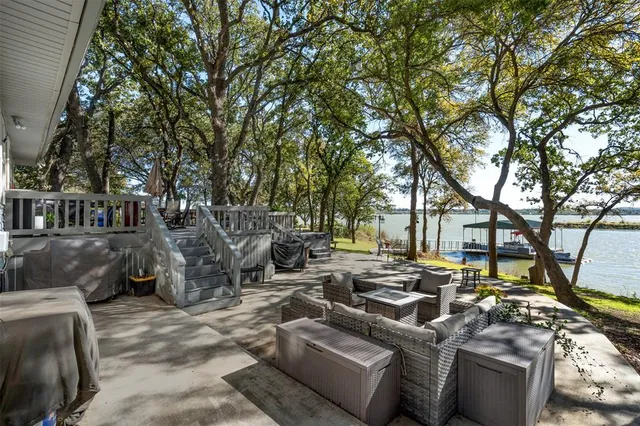 a view of a patio with furniture