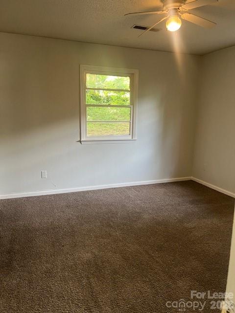 318 Salisbury Road Statesville, NC 28677 - Photo 6 of 6 an empty room with a window