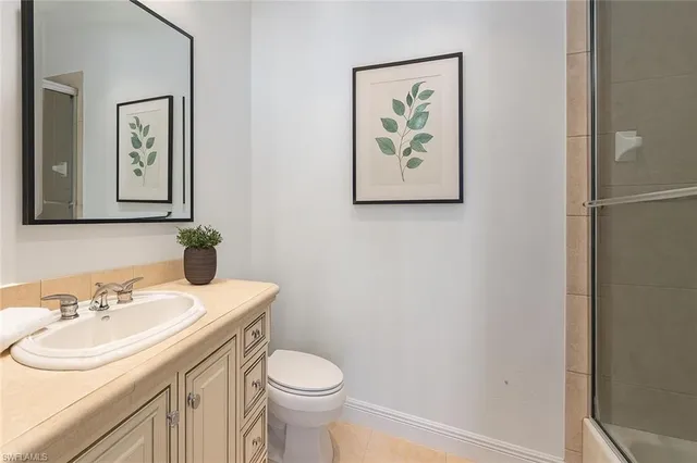 a bathroom with a sink and a toilet