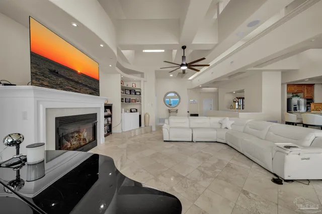 a view of a roof deck with wooden floor and fence