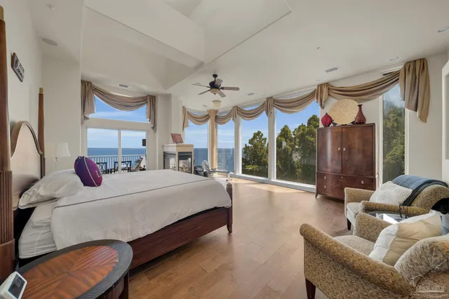 a bathroom with a double vanity sink mirror and shower