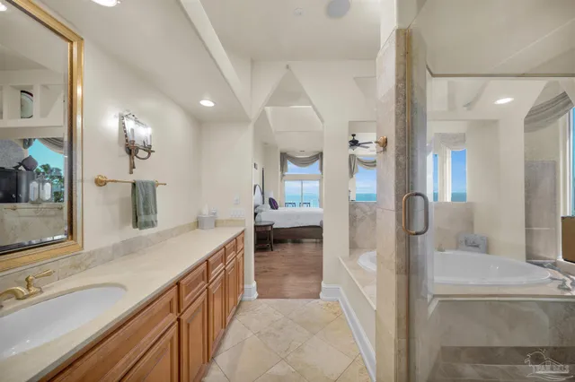 a kitchen with granite countertop a sink and cabinets