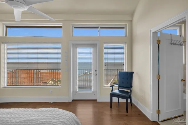 an aerial view of a house with swimming pool garden and patio