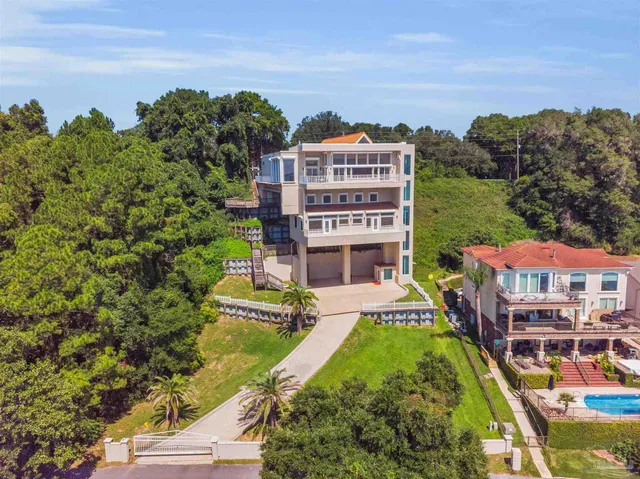 a kitchen with a table and chairs