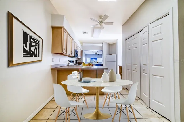 a view of kitchen and dining room with furniture