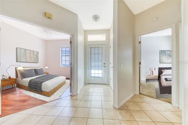 a bedroom with bed and window