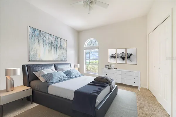 a bathroom with a granite countertop toilet sink and mirror