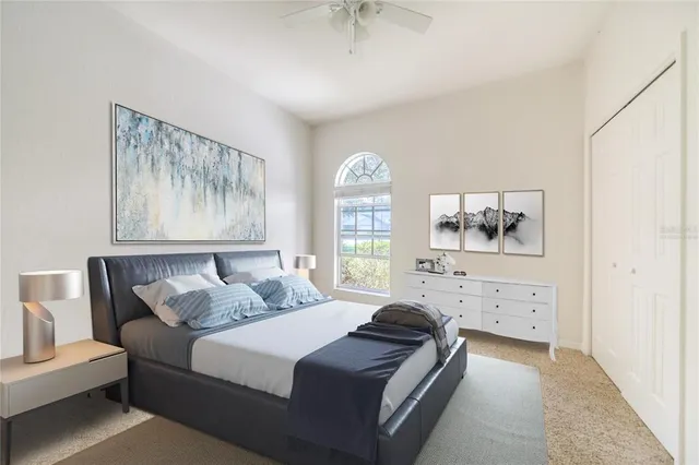 a bathroom with a granite countertop toilet sink and mirror