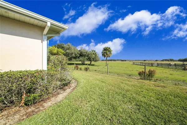 a view of a swimming pool and an outdoor space