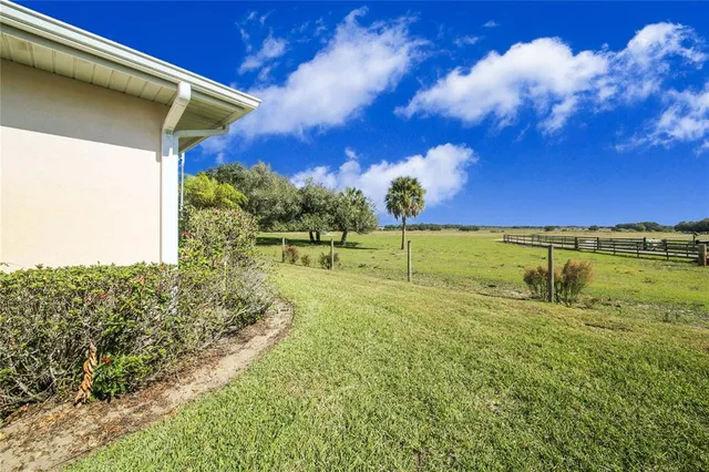 a view of a swimming pool and an outdoor space