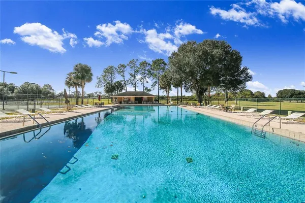 a view of street with parked cars