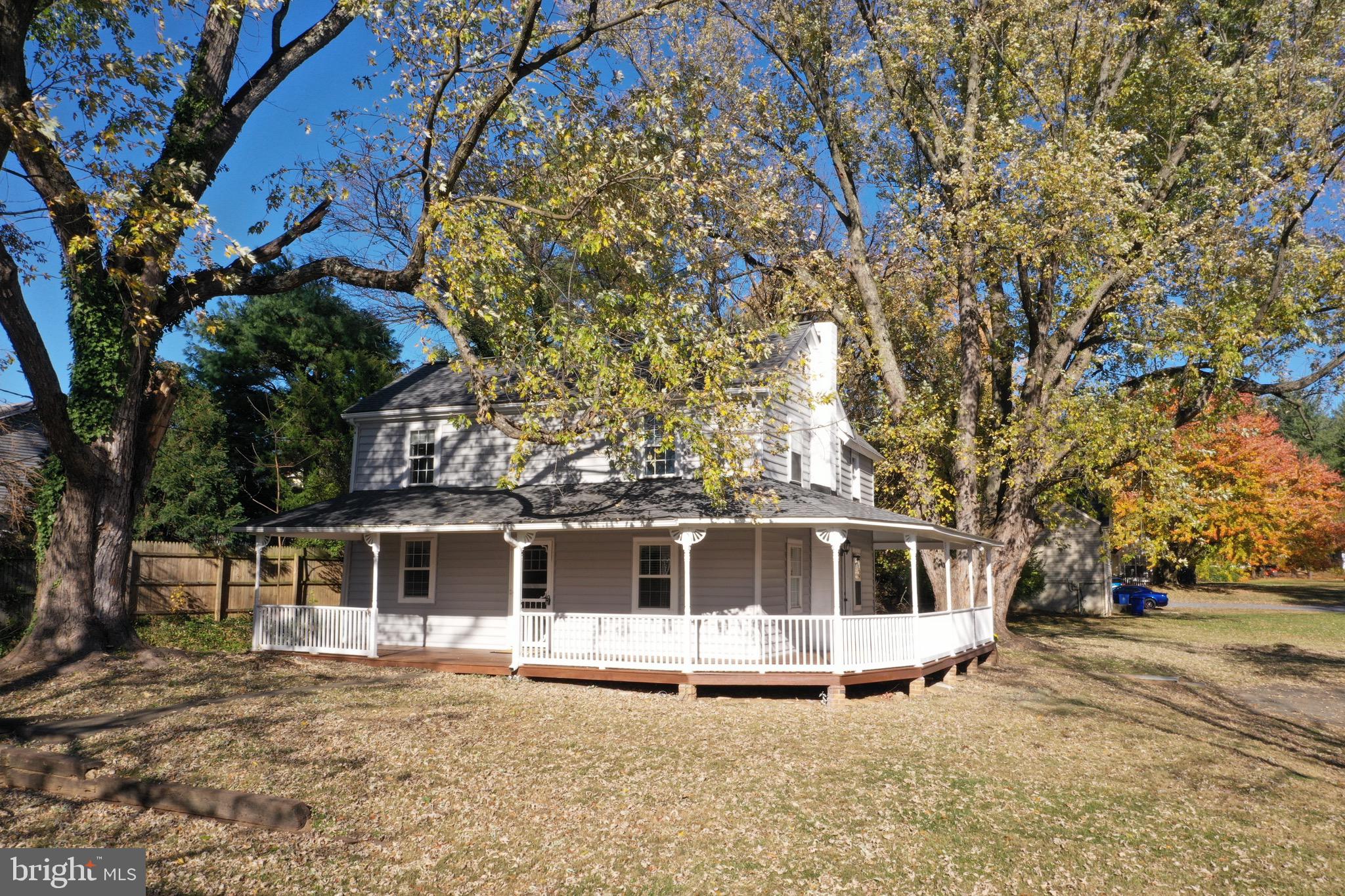 8547 Emory Grove Road Gaithersburg, MD 20877 - Photo 16 of 18 a front view of a house with a yard