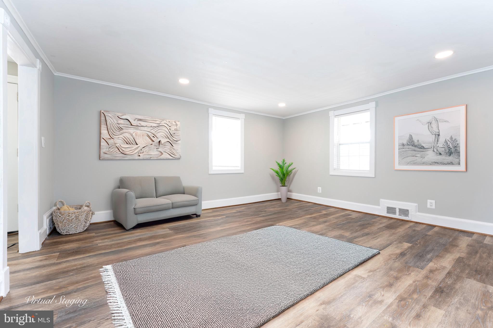 8547 Emory Grove Road Gaithersburg, MD 20877 - Photo 3 of 18 a living room with furniture and window