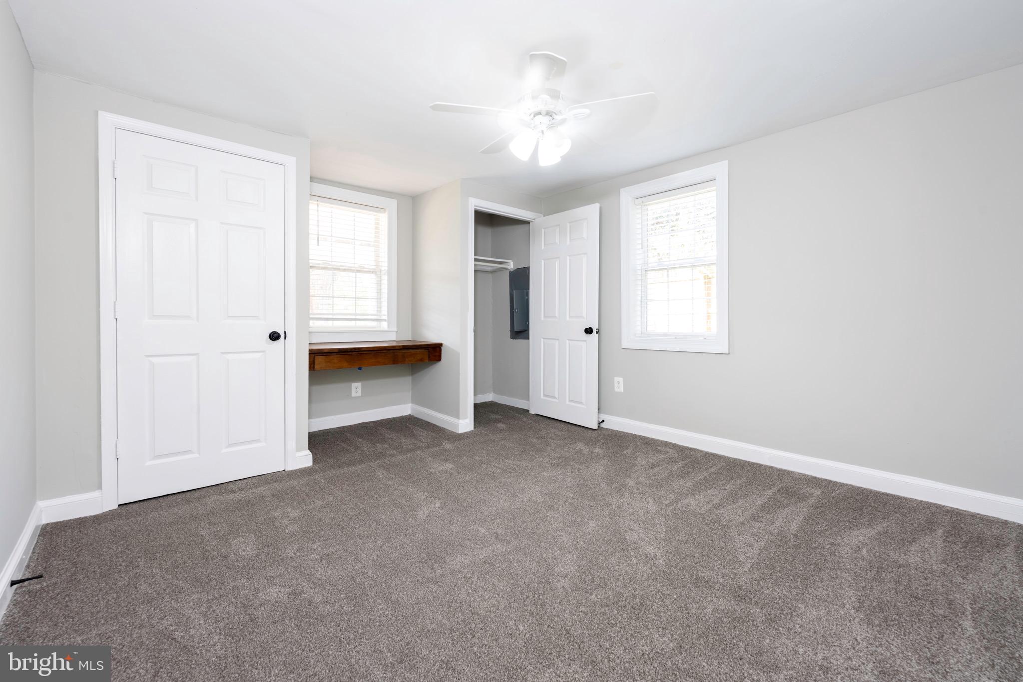 8547 Emory Grove Road Gaithersburg, MD 20877 - Photo 8 of 18 an empty room with windows and closet