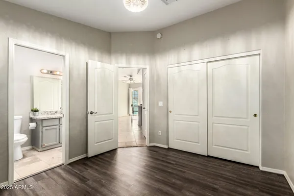 a view of a bathroom with wooden floor