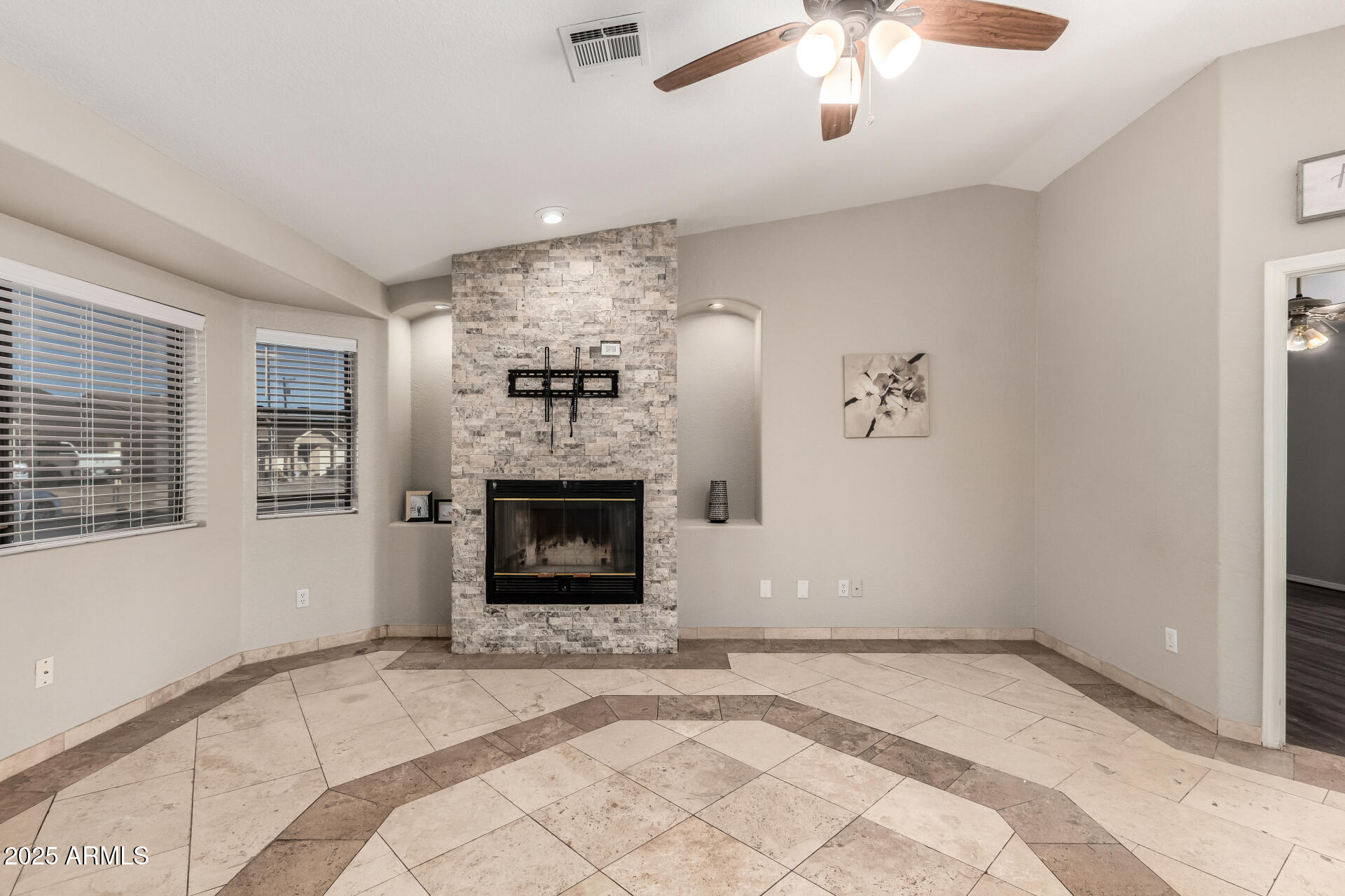 540 South Stardust Lane Apache Junction, AZ 85120 - Photo 6 of 32 a view of empty room with a fireplace