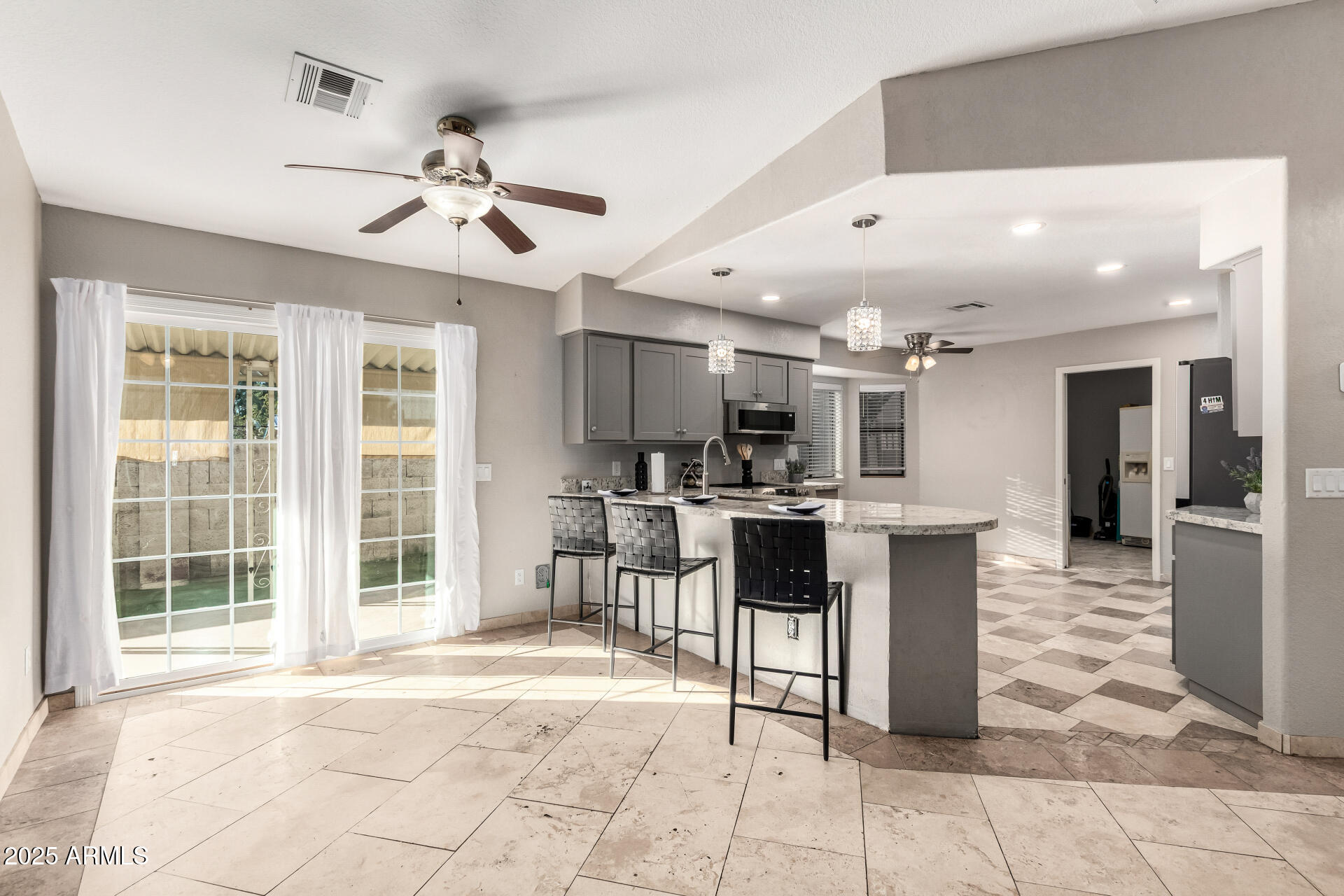 540 South Stardust Lane Apache Junction, AZ 85120 - Photo 8 of 32 a view of a dining area with furniture and a chandelier