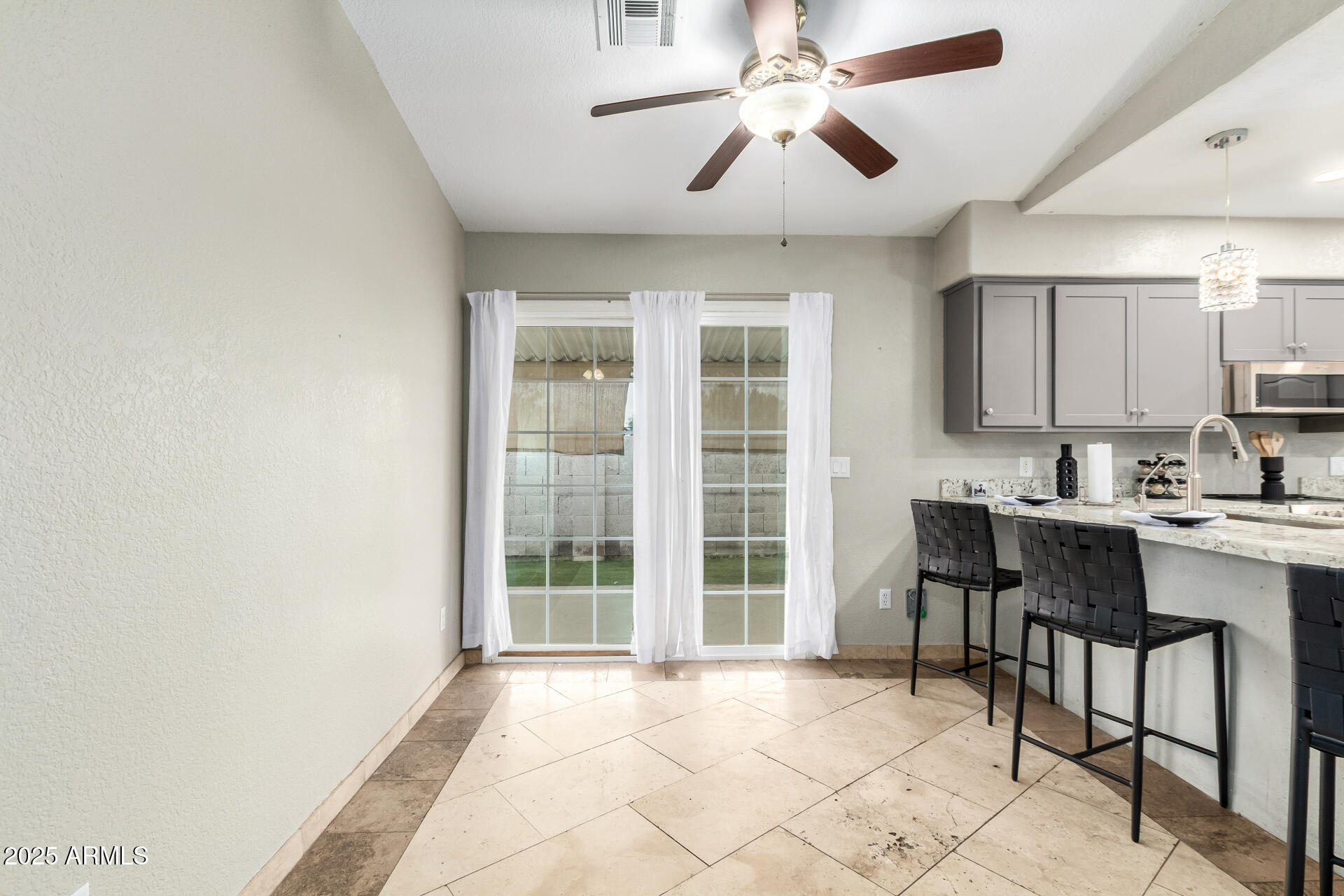 540 South Stardust Lane Apache Junction, AZ 85120 - Photo 9 of 32 a view of a kitchen with a sink and cabinets