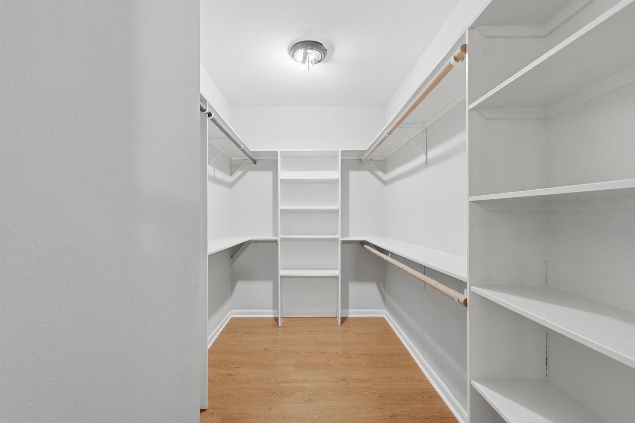 25611 Timberlane Drive Spring, TX 77386 - Photo 23 of 38 a view of an empty walk in closet