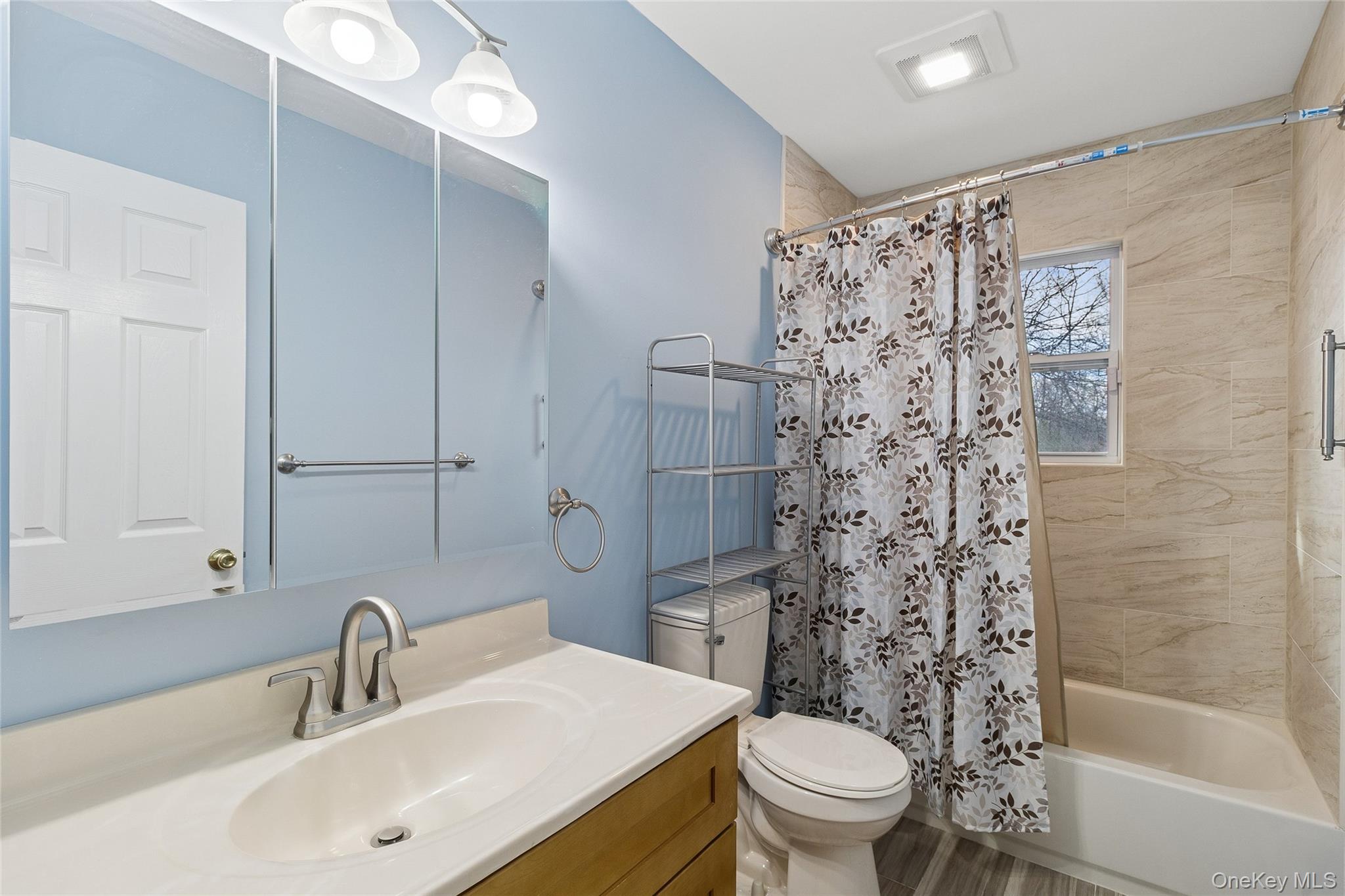 361 Decatur Avenue Shirley, NY 11967 - Photo 17 of 33 Full bath featuring vanity and shower / bath combo