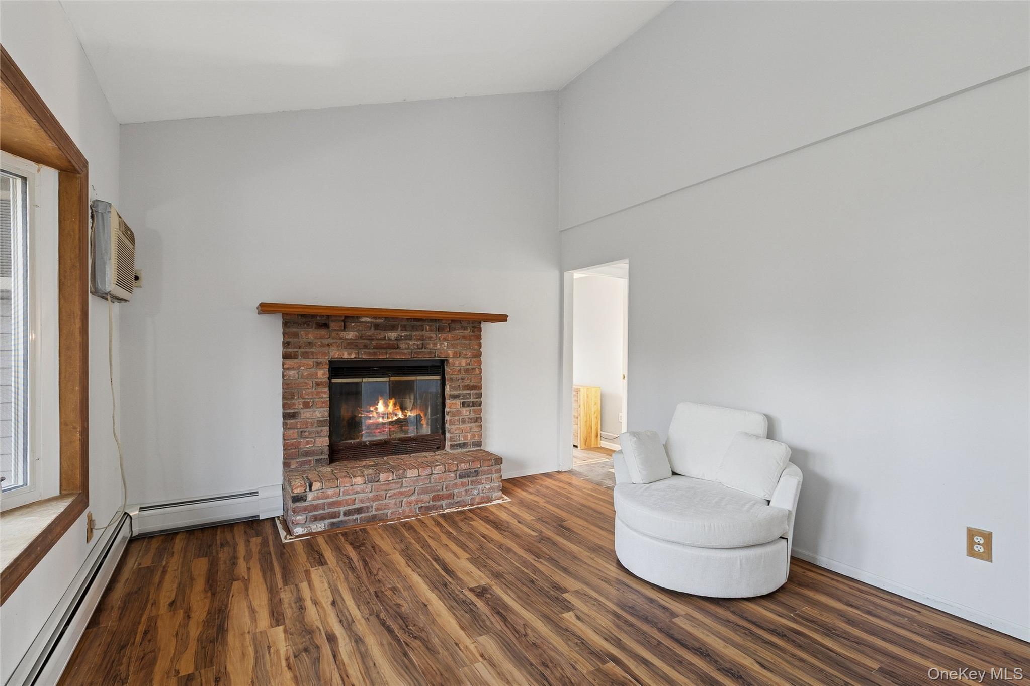 361 Decatur Avenue Shirley, NY 11967 - Photo 22 of 33 Living area Wood burning fireplace