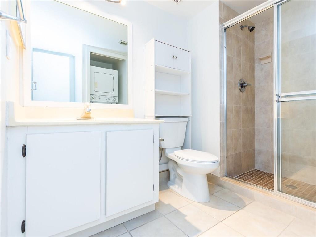 16243 Saddle Club Road, Unit 204 Weston, FL 33326 - Photo 14 of 48 a bathroom with a sink toilet and shower