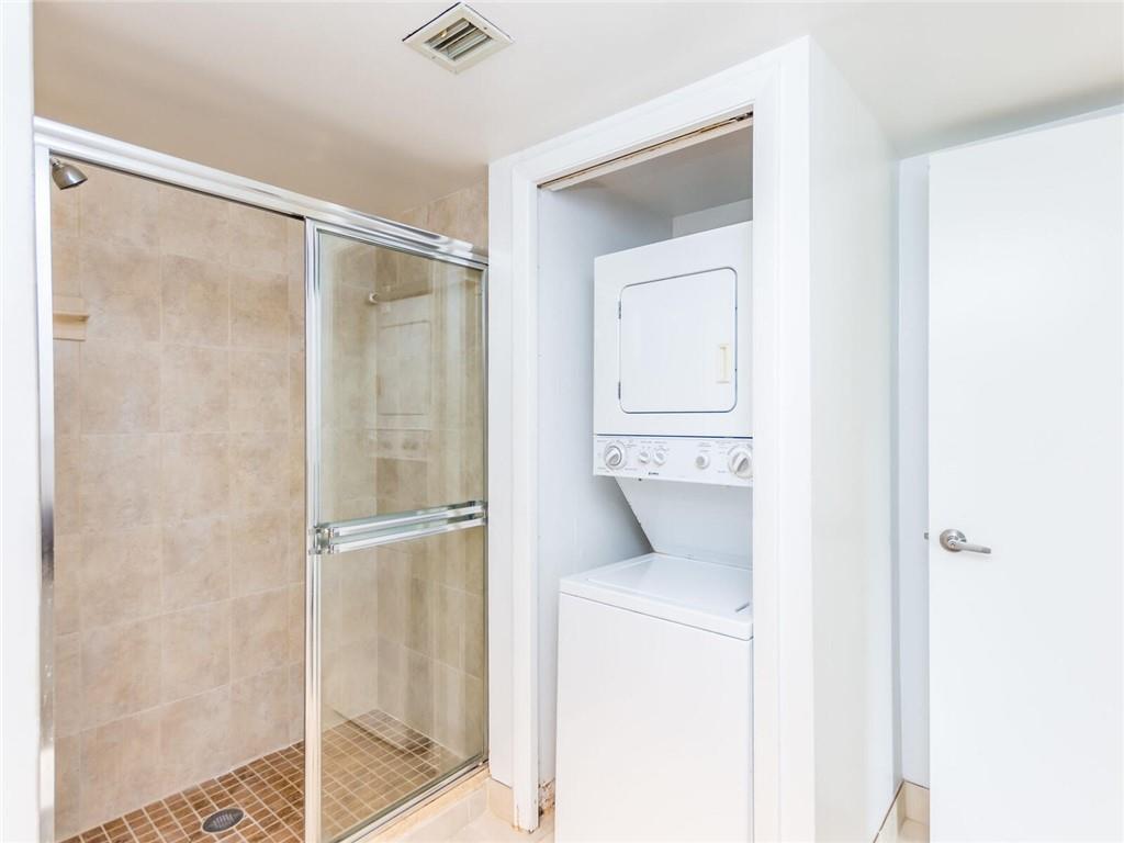 16243 Saddle Club Road, Unit 204 Weston, FL 33326 - Photo 15 of 48 a utility room with dryer and washer