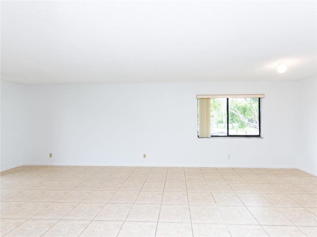 16243 Saddle Club Road, Unit 204 Weston, FL 33326 - Photo 20 of 48 an empty room with a window