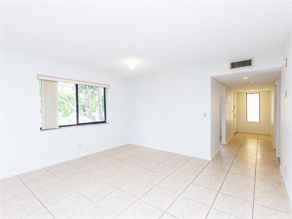 16243 Saddle Club Road, Unit 204 Weston, FL 33326 - Photo 29 of 48 a view of an empty room with window