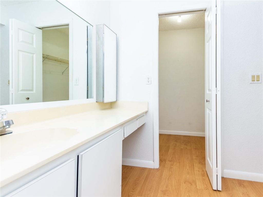 16243 Saddle Club Road, Unit 204 Weston, FL 33326 - Photo 33 of 48 a bathroom with a sink and a mirror