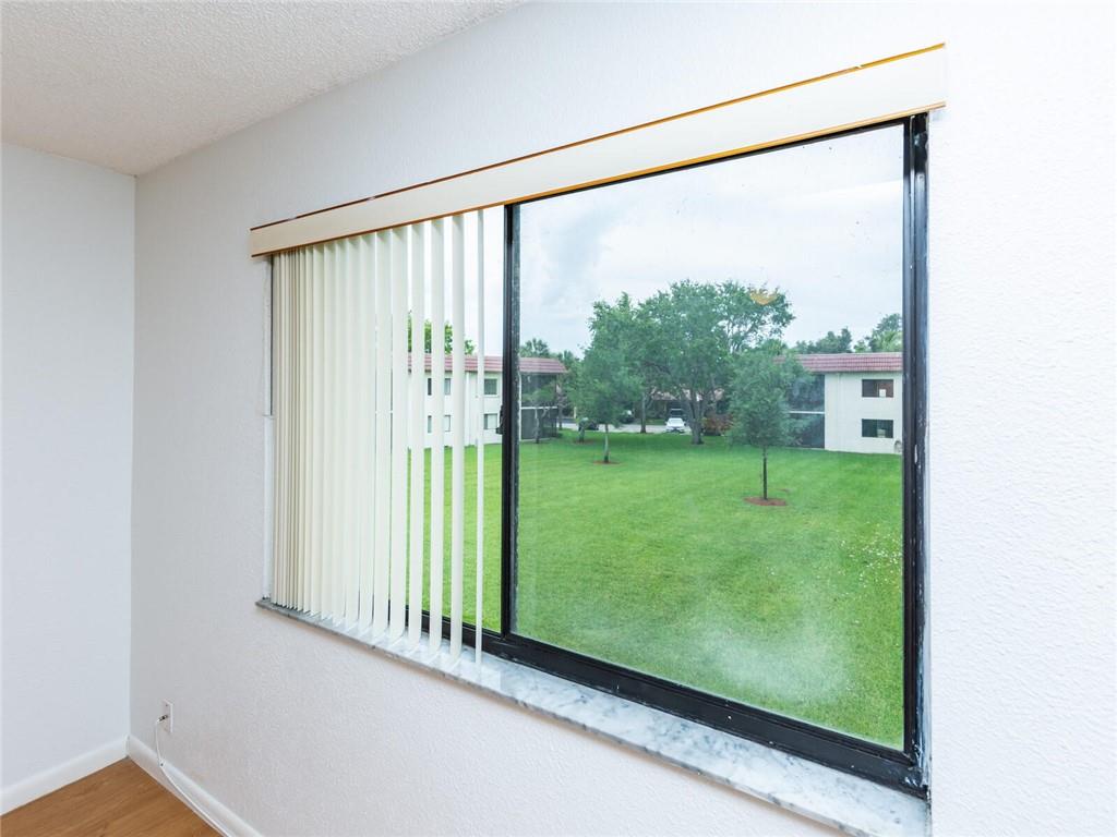 16243 Saddle Club Road, Unit 204 Weston, FL 33326 - Photo 38 of 48 a view of a back yard from a window