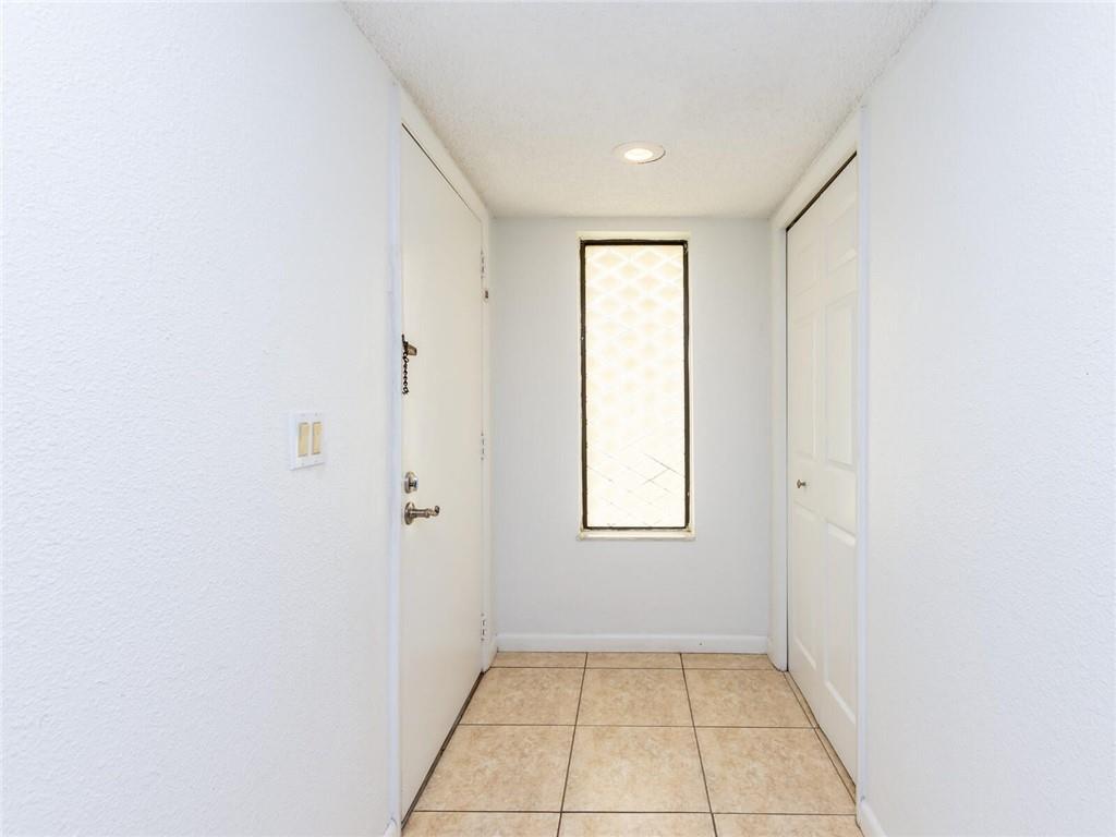 16243 Saddle Club Road, Unit 204 Weston, FL 33326 - Photo 4 of 48 a view of an empty room with a window