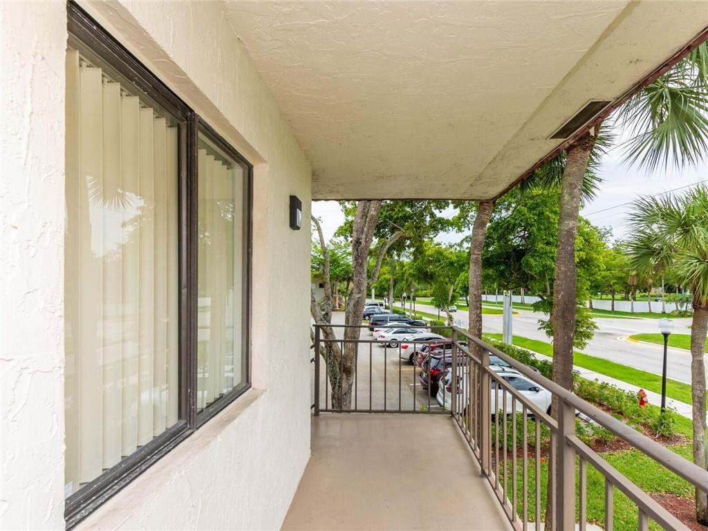 16243 Saddle Club Road, Unit 204 Weston, FL 33326 - Photo 41 of 48 a view of a porch