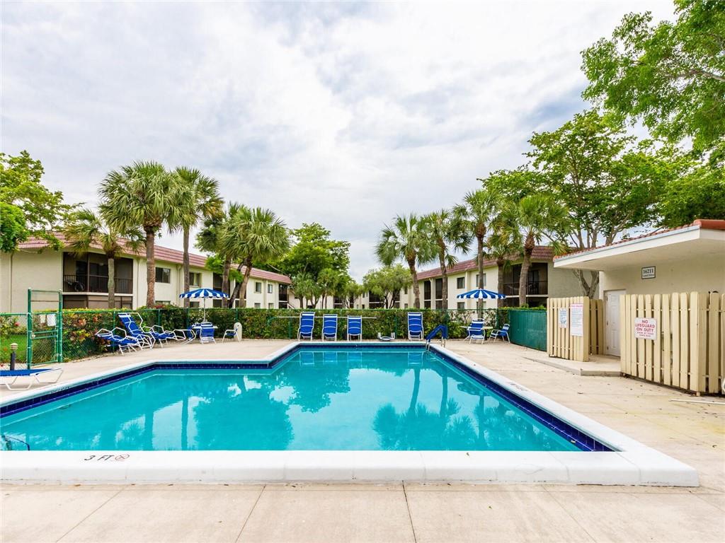 16243 Saddle Club Road, Unit 204 Weston, FL 33326 - Photo 48 of 48 a view of a house with swimming pool and sitting area