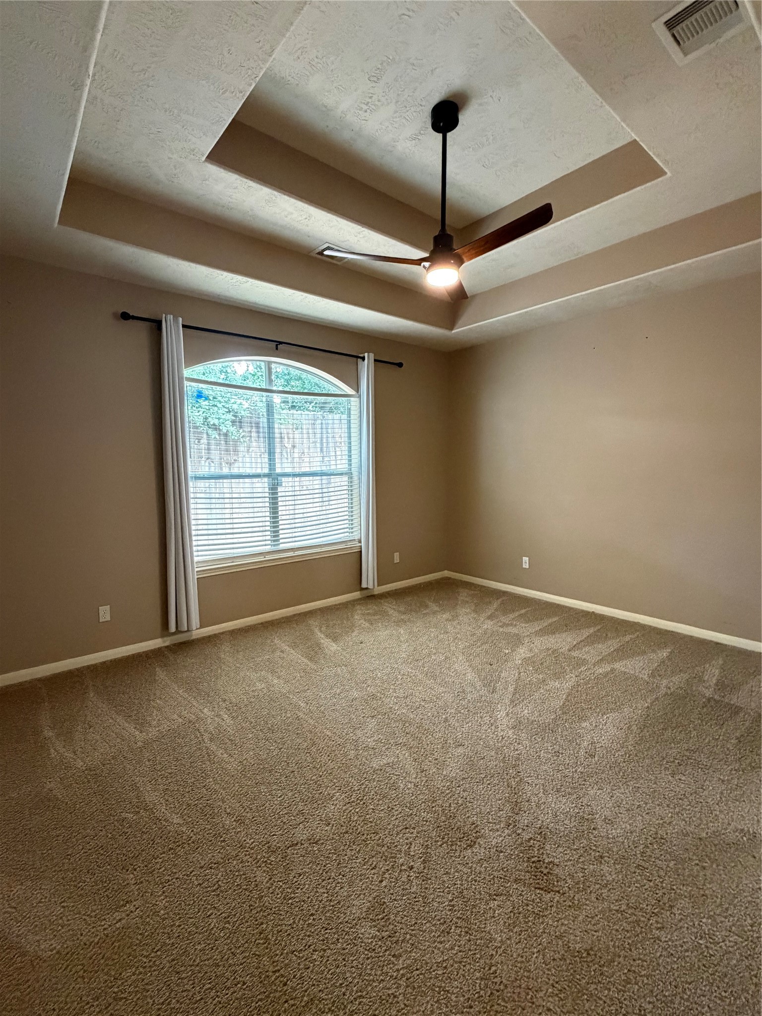 903 Cascade Ridge Katy, TX 77494 - Photo 10 of 24 a view of an empty room with a window