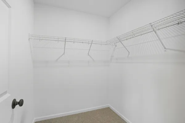 a view of a room with racks on the wall