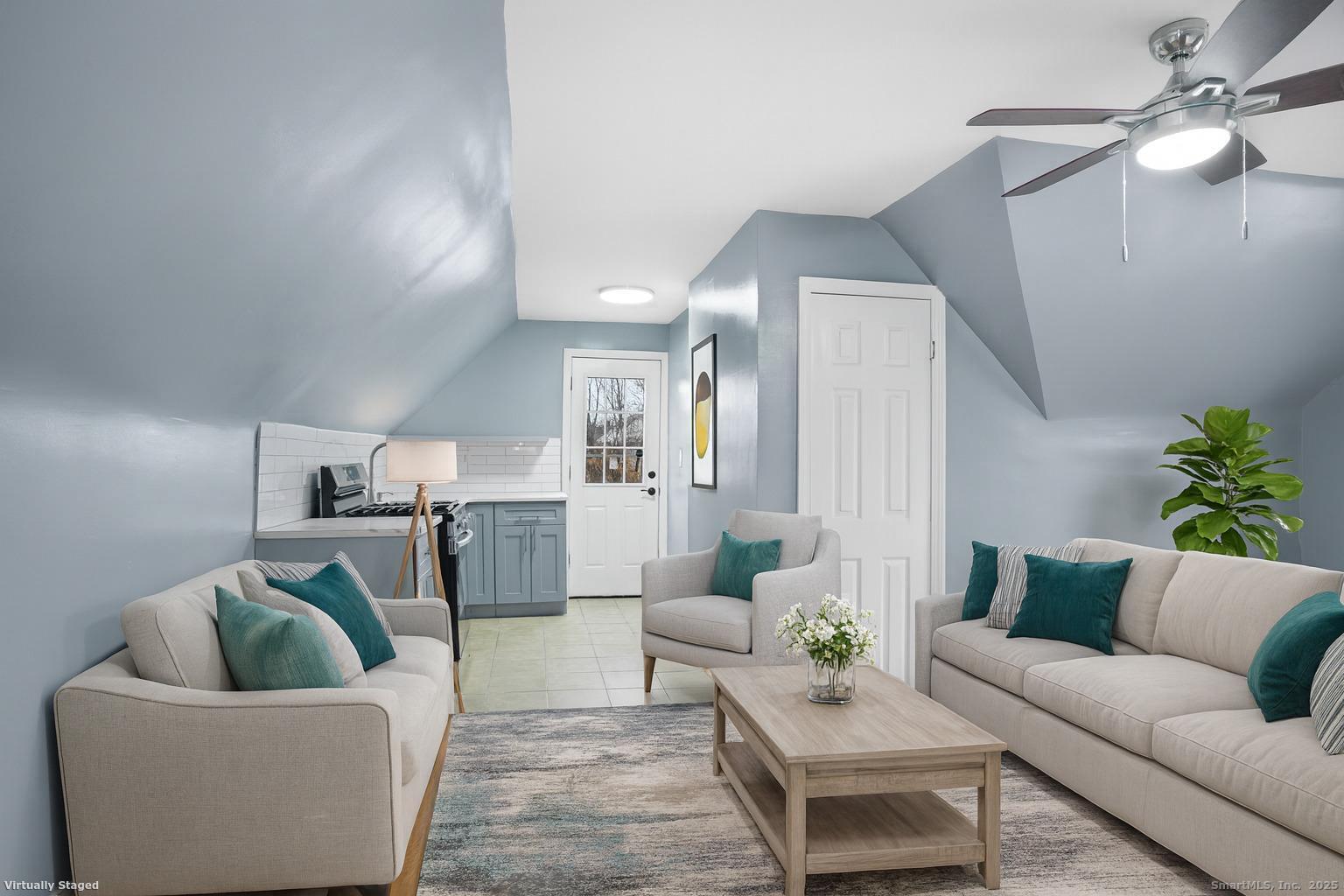 a living room with furniture and a couch