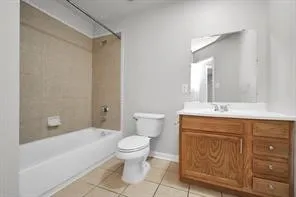 a bathroom with a sink a toilet and a bathtub