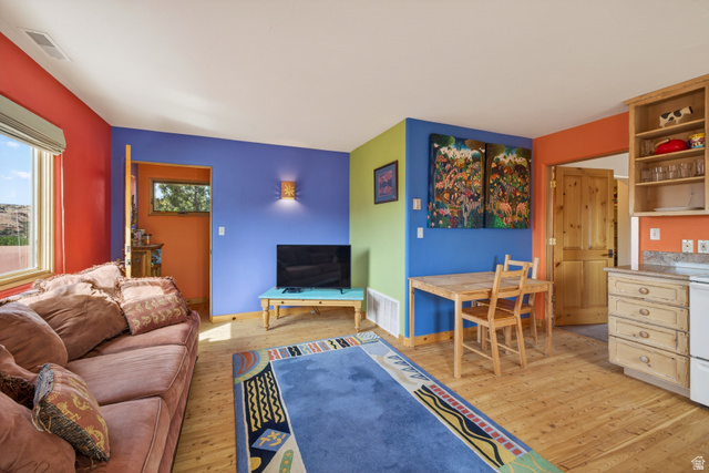 3617 Red Rock Drive Moab, UT 84532 - Photo 73 of 79 Living room with light wood finished floors and baseboards