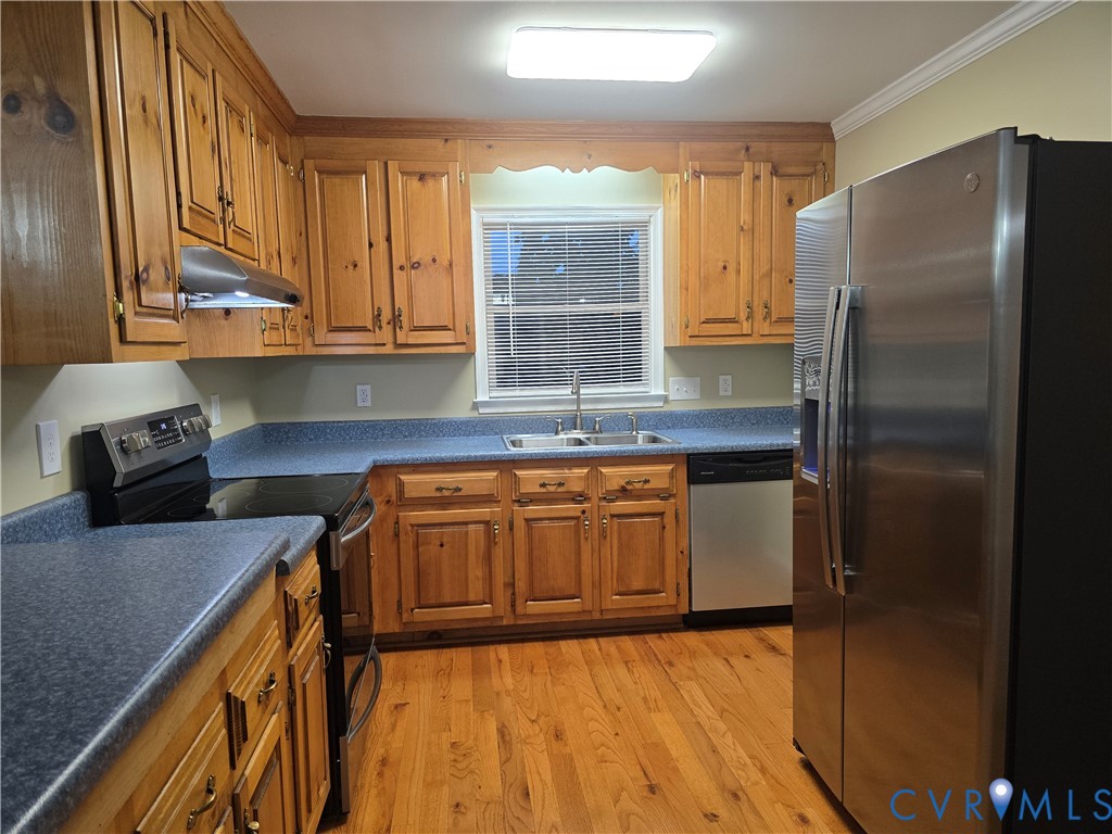 14300 Michaux View Way Midlothian, VA 23113 - Photo 13 of 29 a kitchen with granite countertop a refrigerator a sink and wooden cabinets