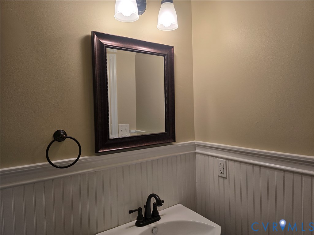 14300 Michaux View Way Midlothian, VA 23113 - Photo 15 of 29 a bathroom with a sink a mirror and a window