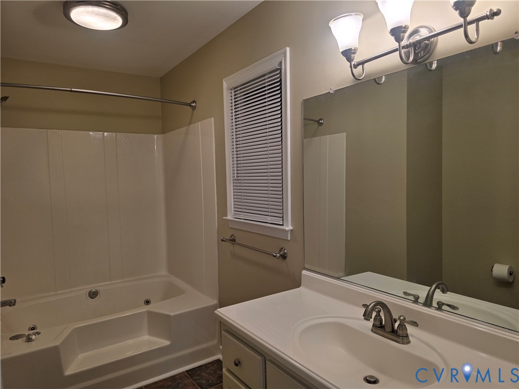 14300 Michaux View Way Midlothian, VA 23113 - Photo 22 of 29 a bathroom with a sink and a mirror