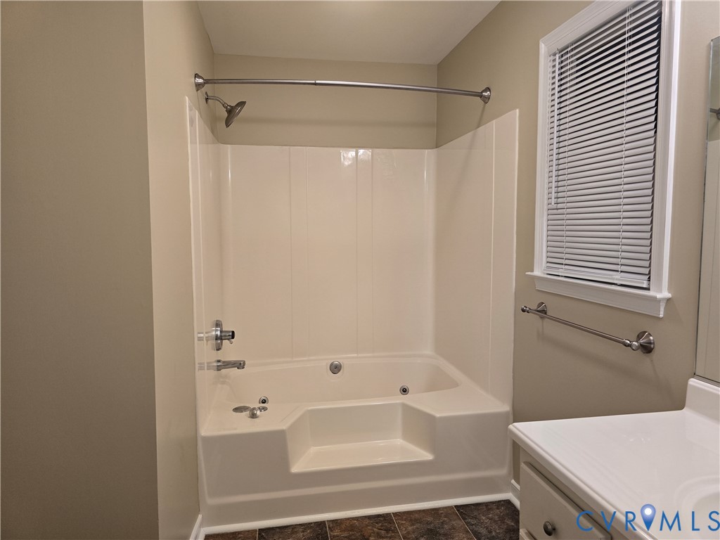 14300 Michaux View Way Midlothian, VA 23113 - Photo 23 of 29 a bathroom with a bathtub and a shower